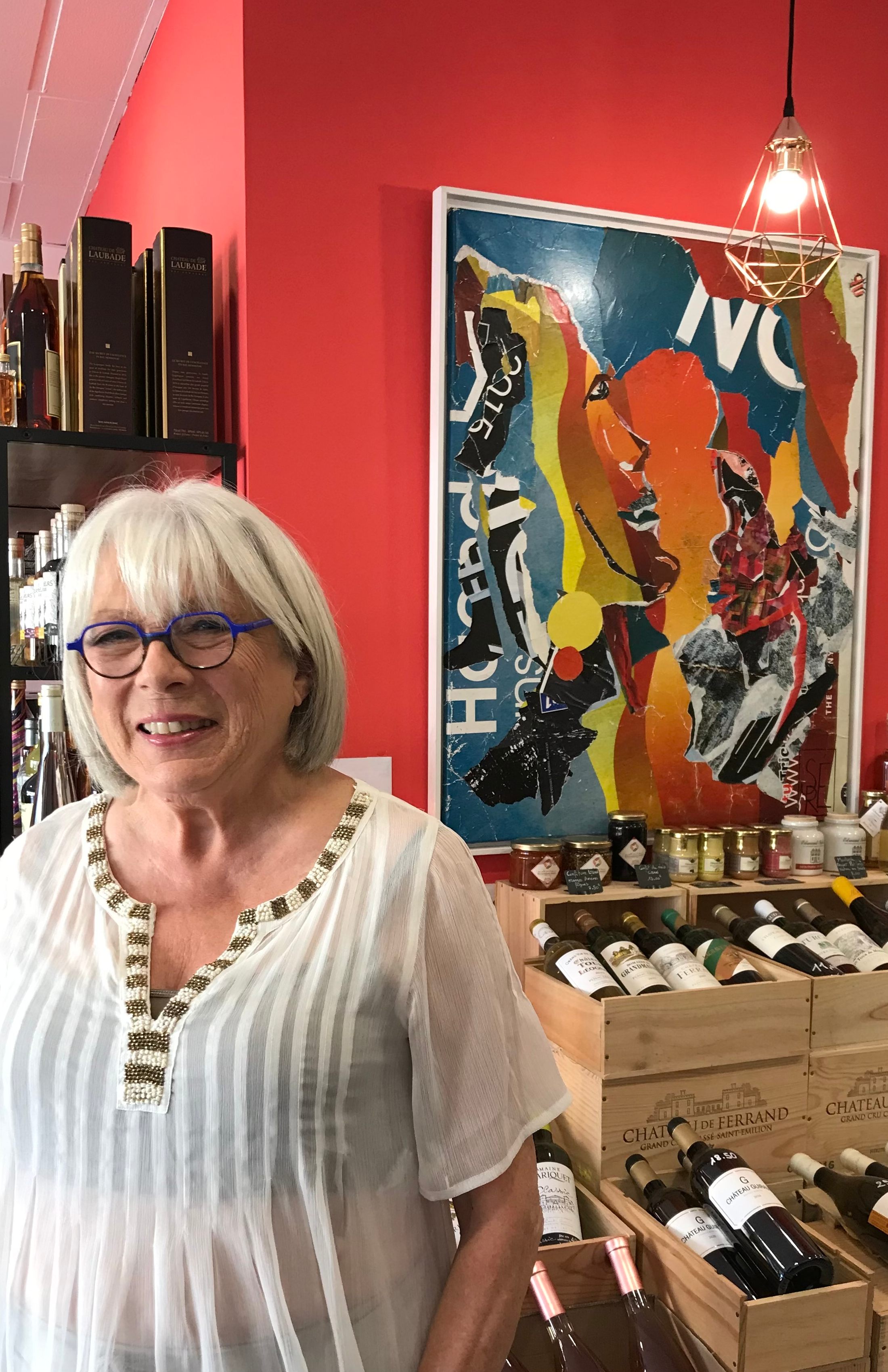 Person using a pen to cross a task off a productivity paper card.