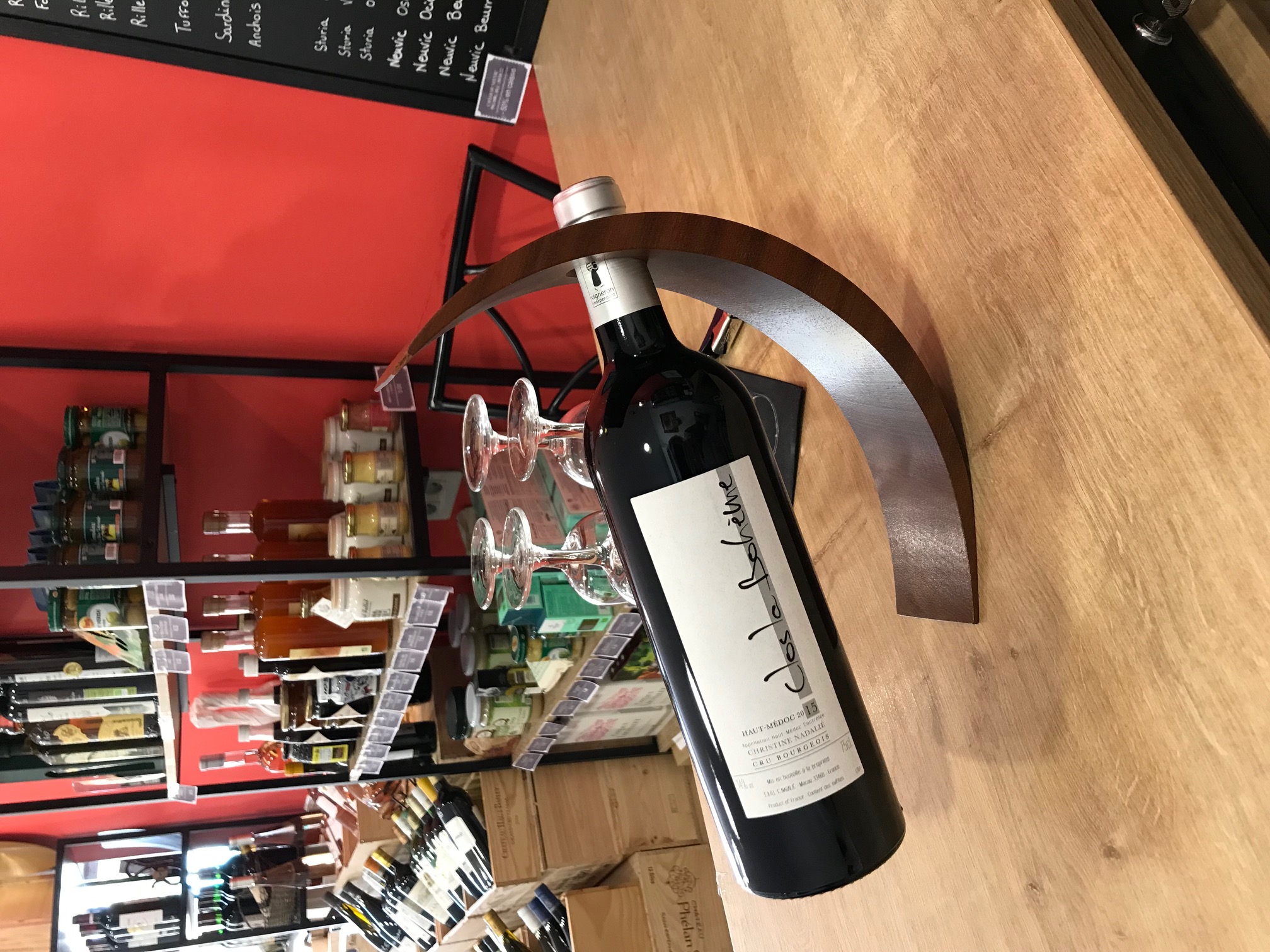 Person using a pen to cross a task off a productivity paper card.