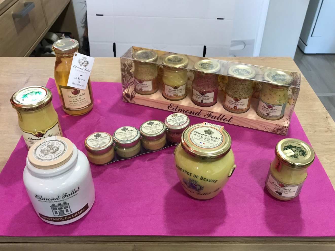 Person using a pen to cross a task off a productivity paper card.