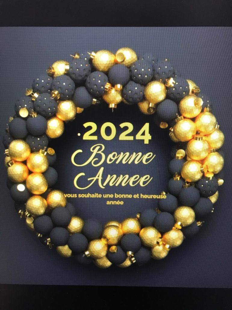 Person using a pen to cross a task off a productivity paper card.