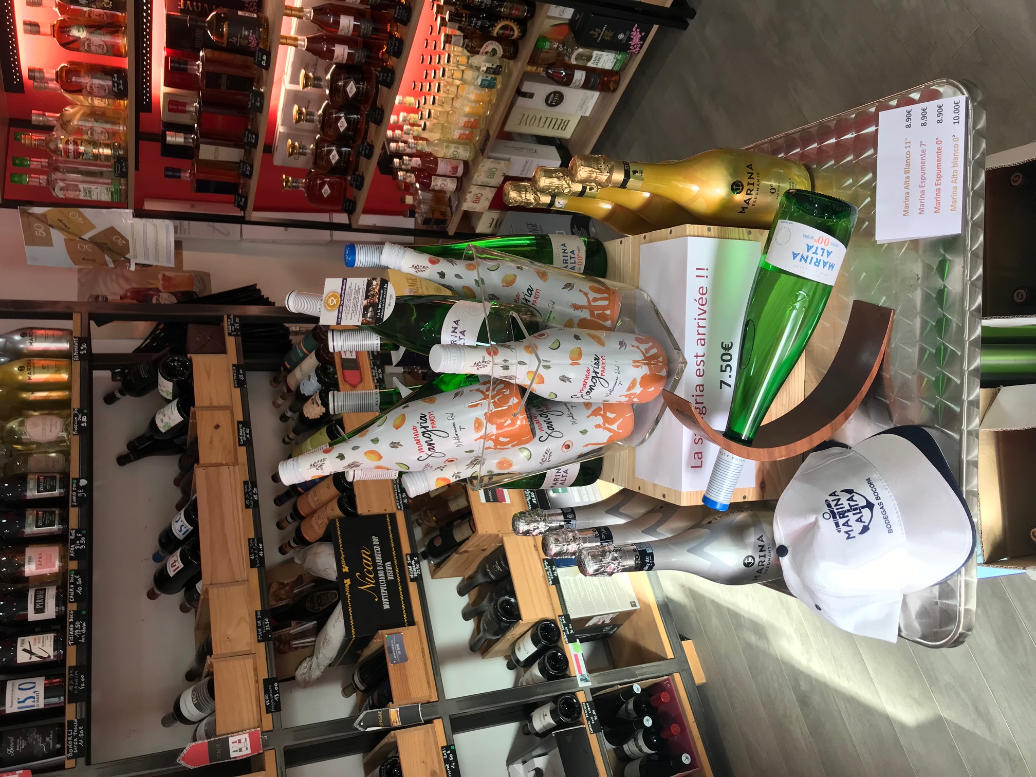 Person using a pen to cross a task off a productivity paper card.