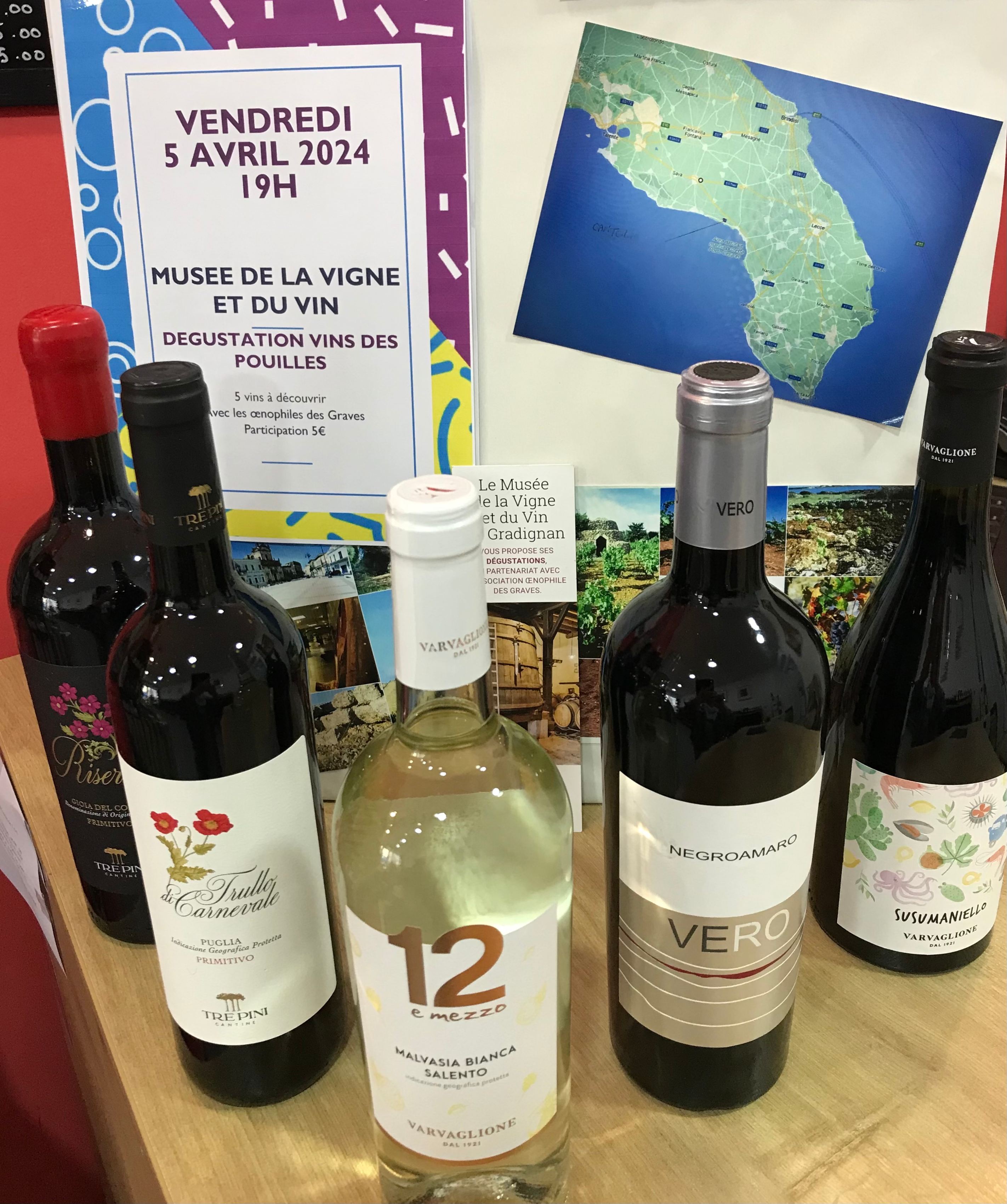 Person using a pen to cross a task off a productivity paper card.