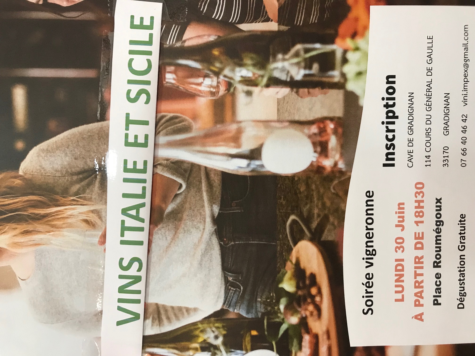 Person using a pen to cross a task off a productivity paper card.