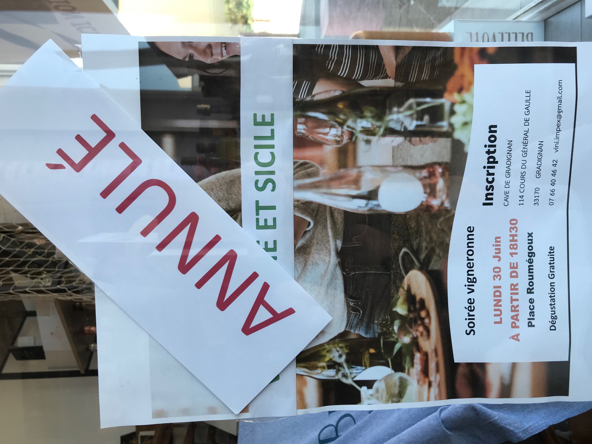 Person using a pen to cross a task off a productivity paper card.