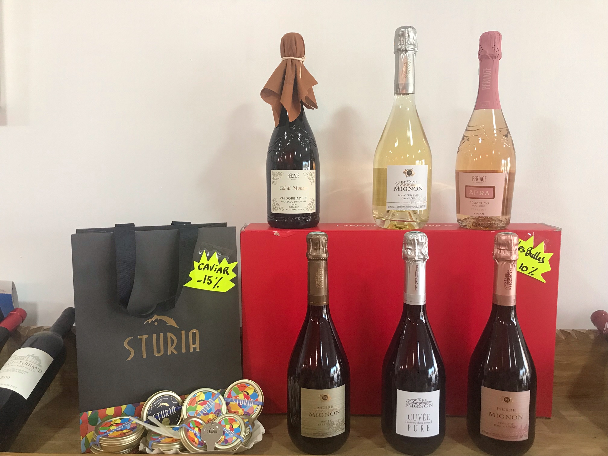 Person using a pen to cross a task off a productivity paper card.