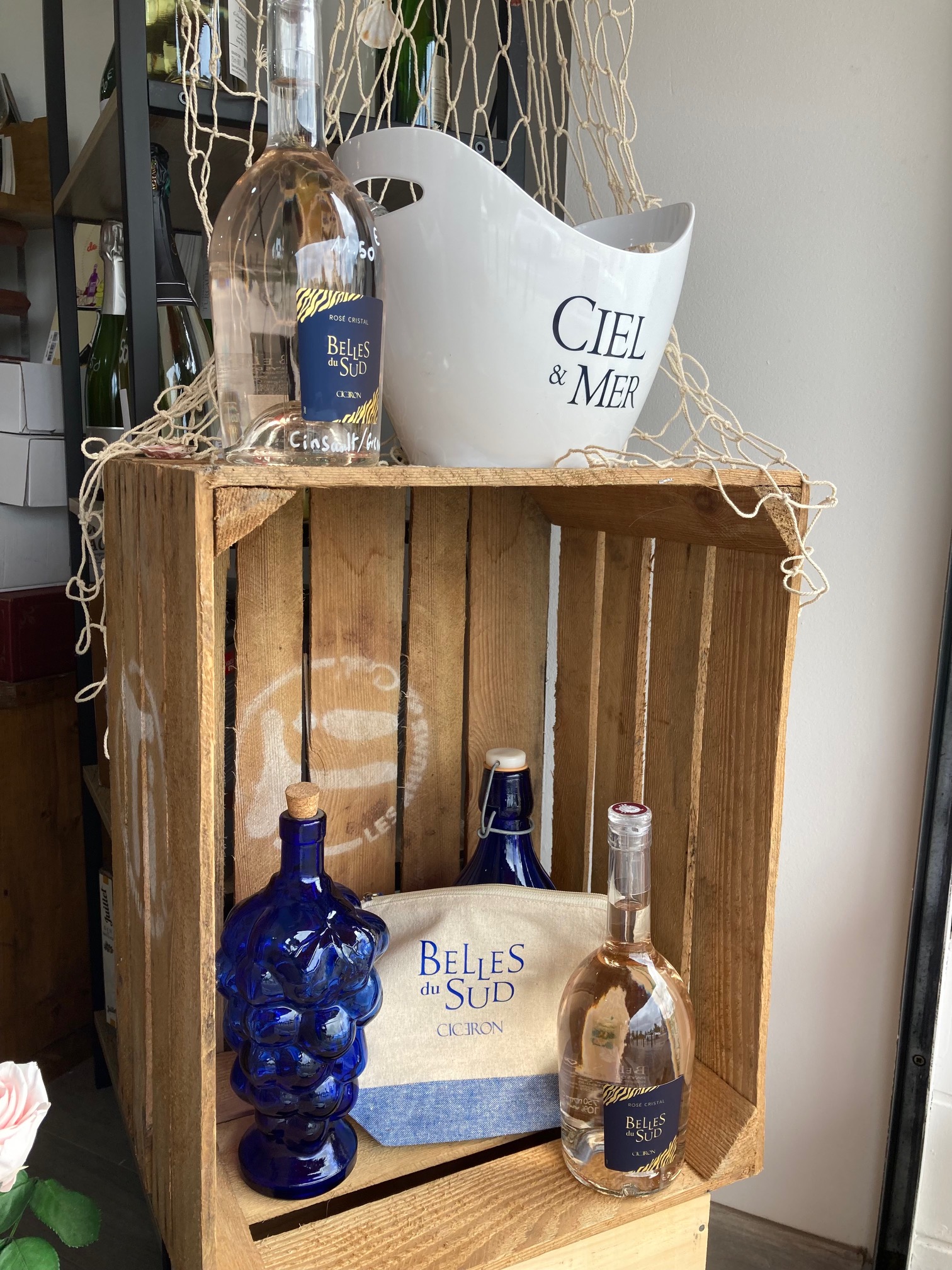 Person using a pen to cross a task off a productivity paper card.