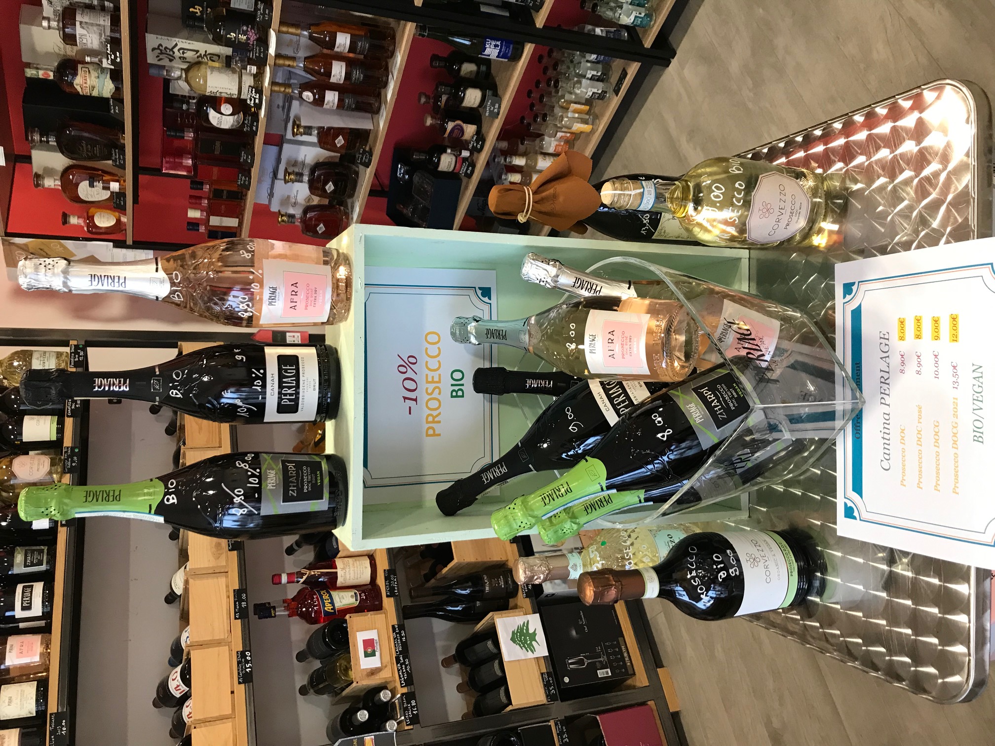 Person using a pen to cross a task off a productivity paper card.