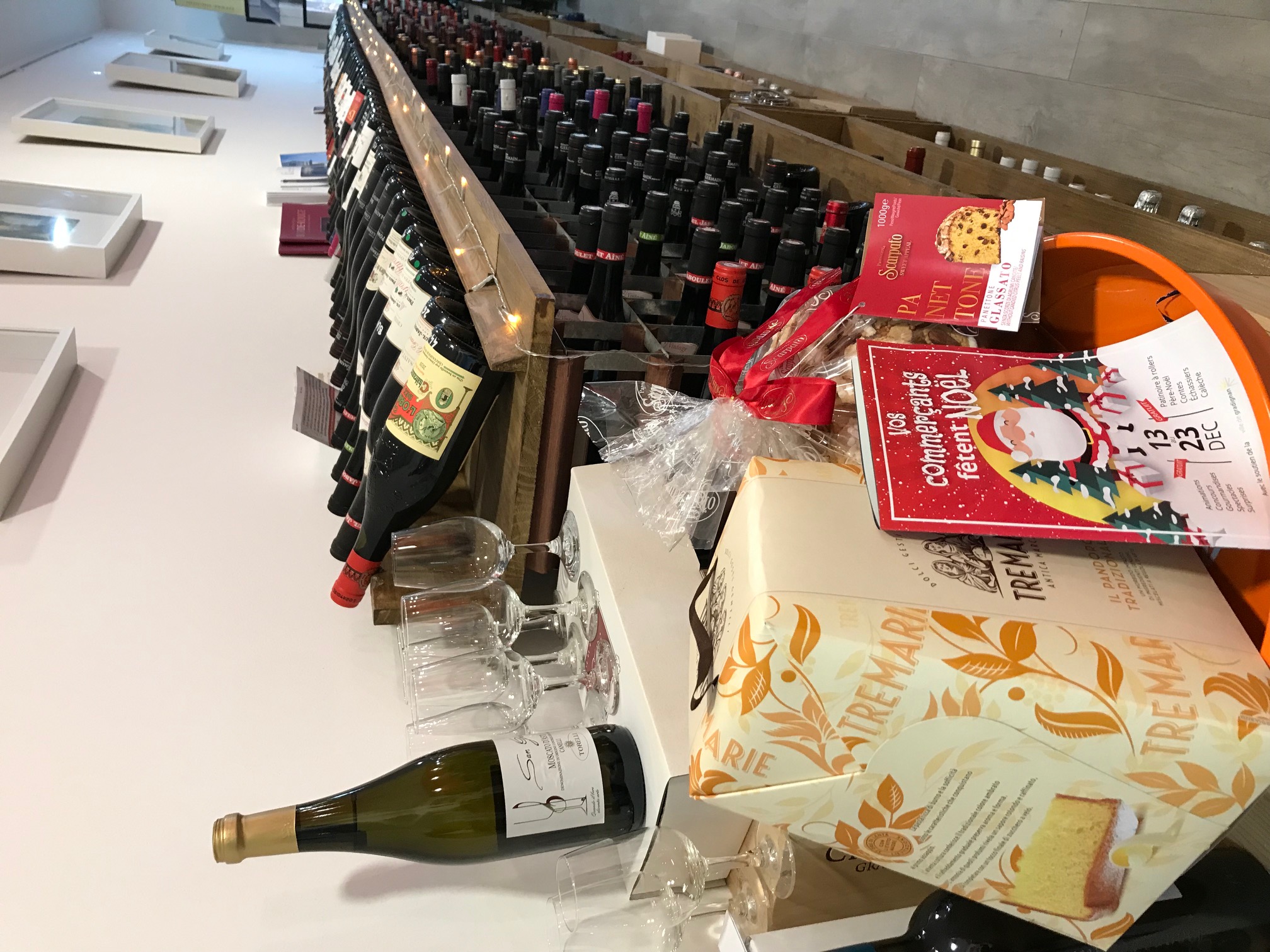 Person using a pen to cross a task off a productivity paper card.