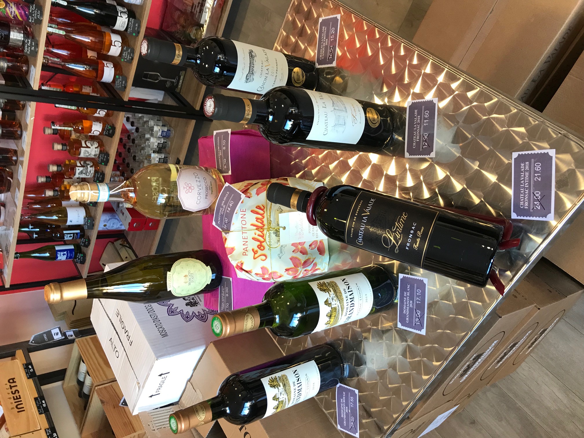 Person using a pen to cross a task off a productivity paper card.